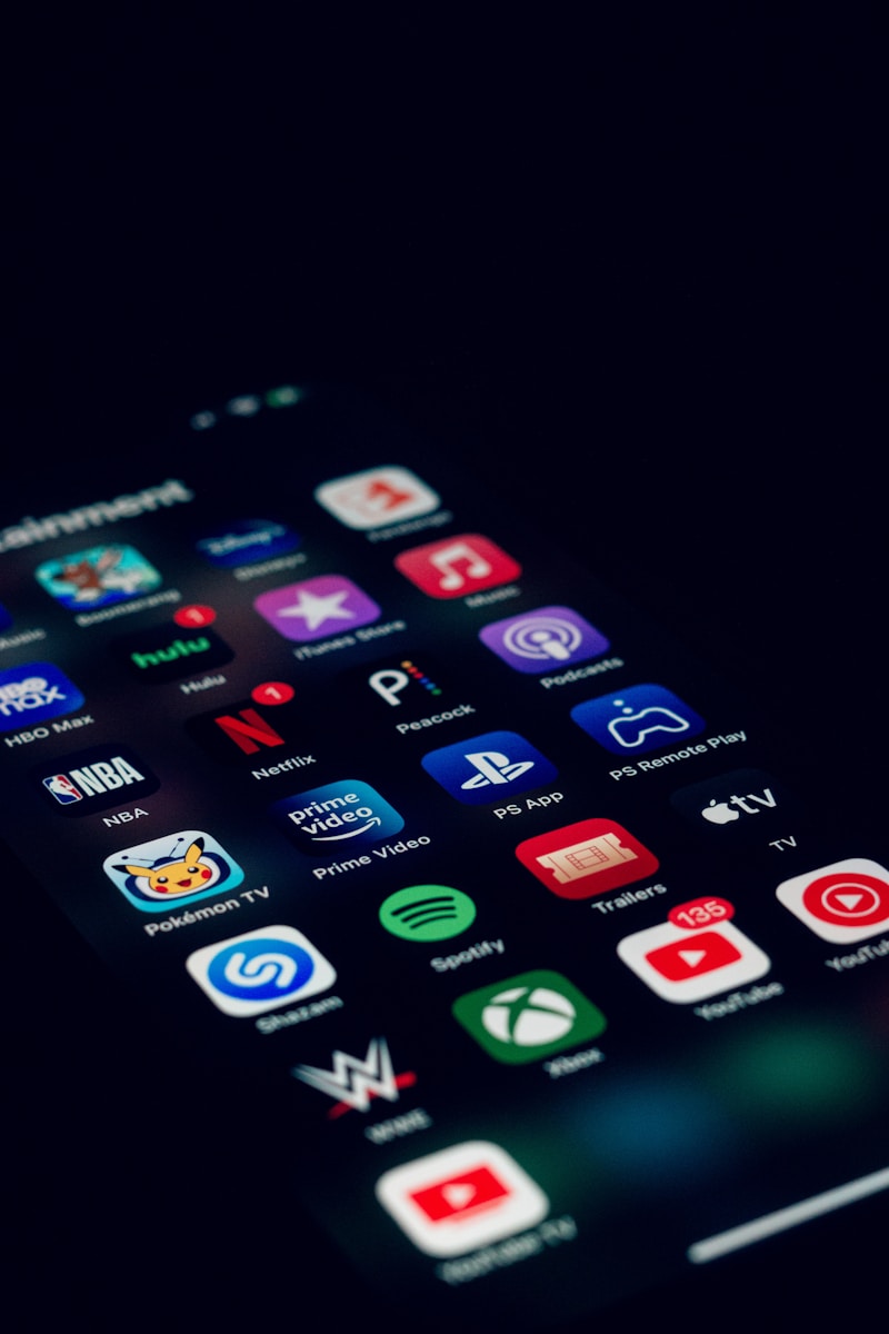 a close up of a cell phone with many different app icons